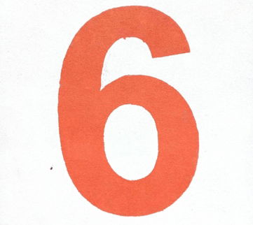 a close up of a number six on a white background